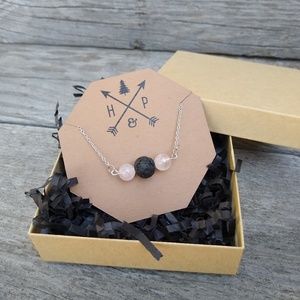 Rose quartz aromatherapy necklace with lava rock